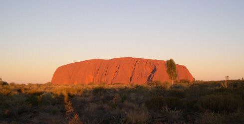 Ayers Rock by the sun's first and last rays
