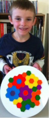Sue's student Joshua with lots of daisies