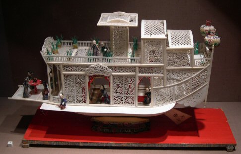 Intricately carved ivory boat