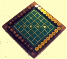 Original style of Leap gameboard, with jazzed-up green mat replacing the original tan