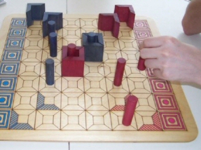 Teleporters game in progress - both players have a teleport in center